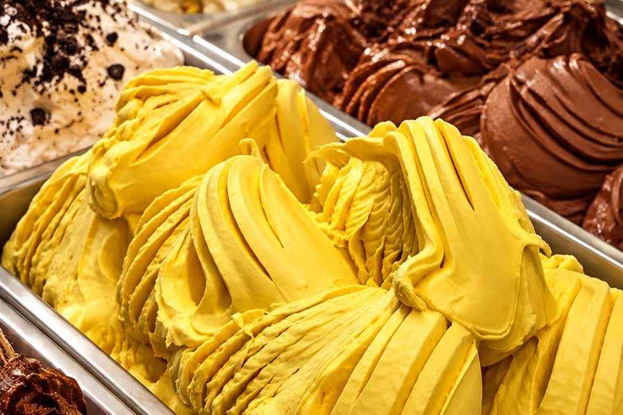 DaVinci Gelato display case with mango, chocolate and pistachio gelato