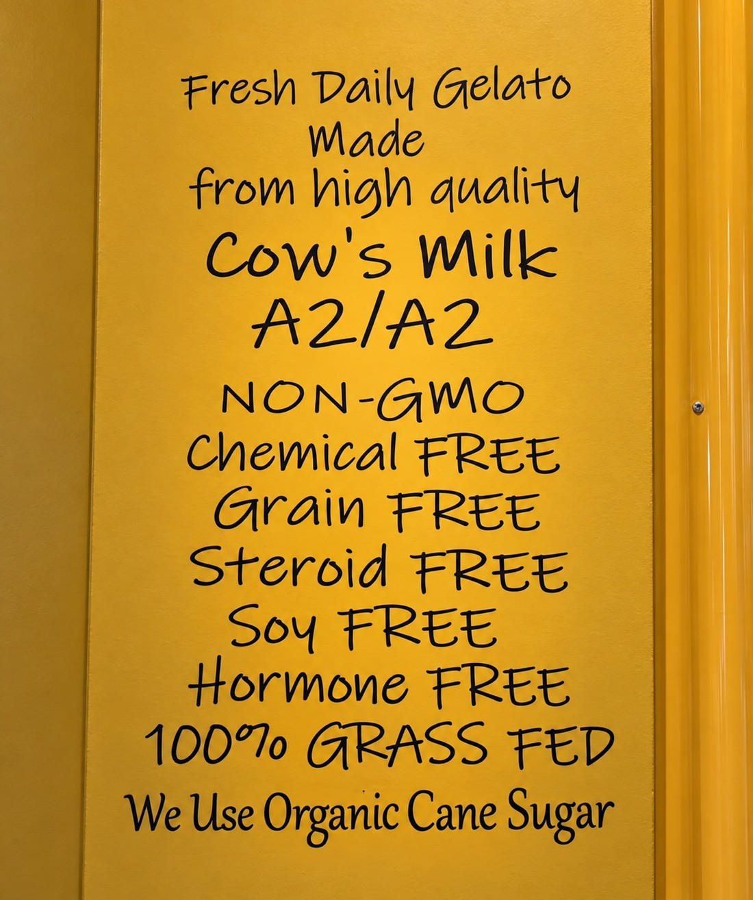 DaVinci Gelato wall sign: fresh daily gelato made from A2/A2 cow's milk, non-GMO, grain free, hormone free, 100% grass fed