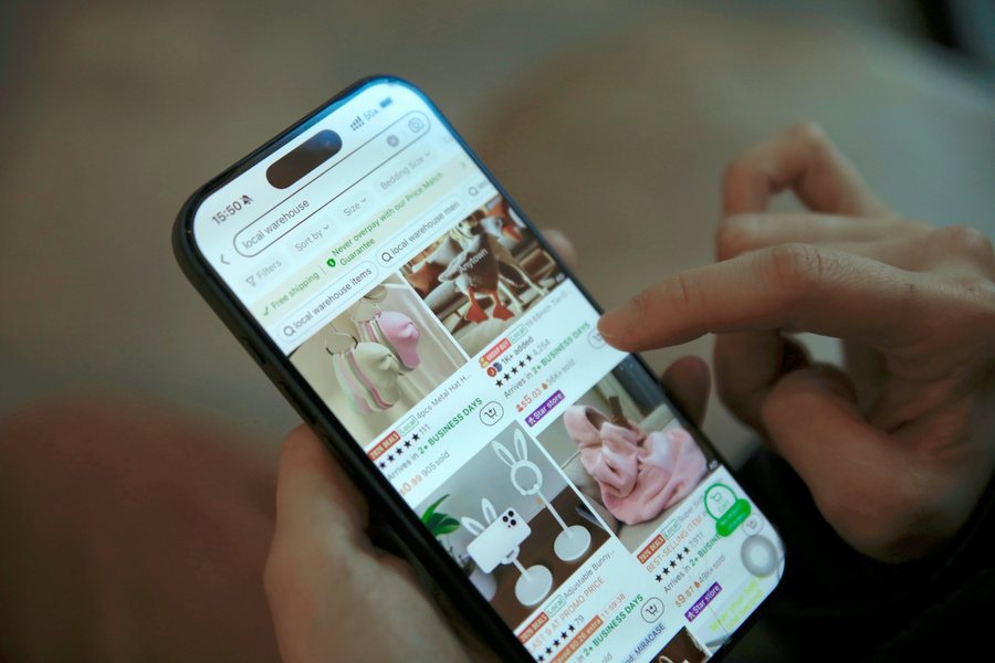 Person scrolling a social app on a phone